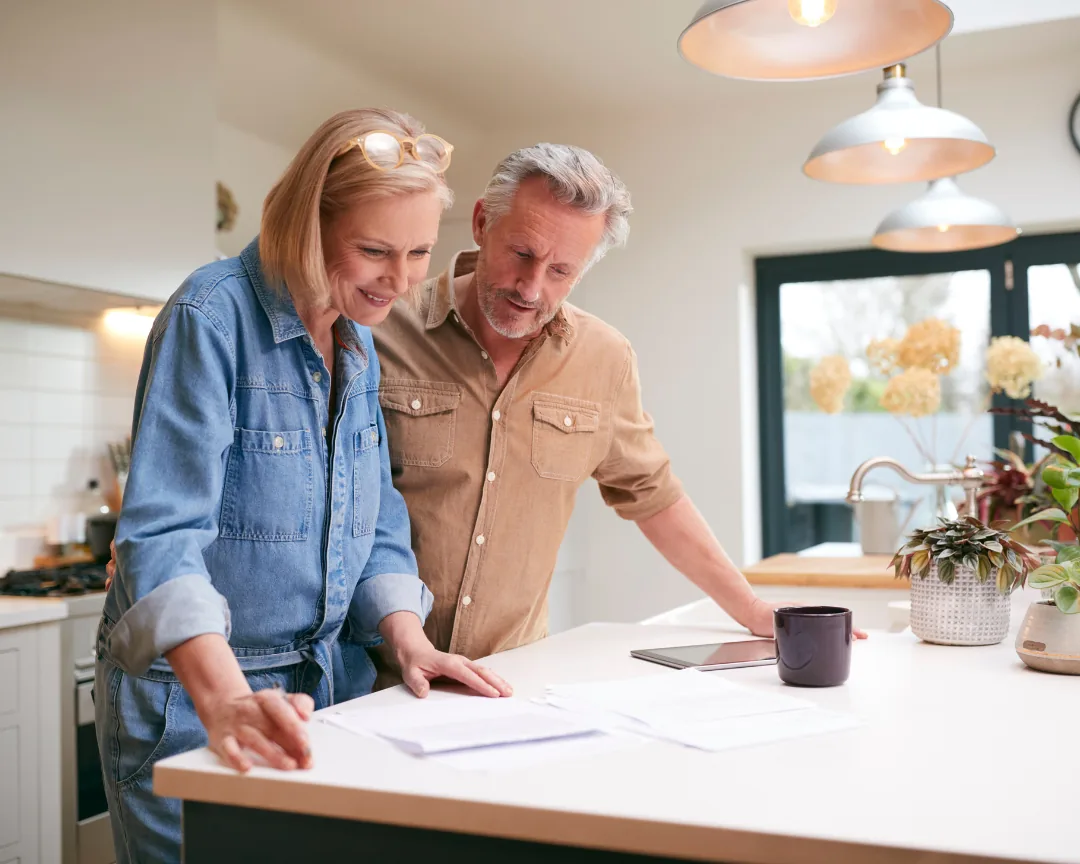 A couple reviewing a fixed deposit plan together