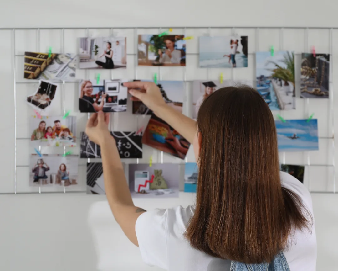 Setting a savings goal on a vision board