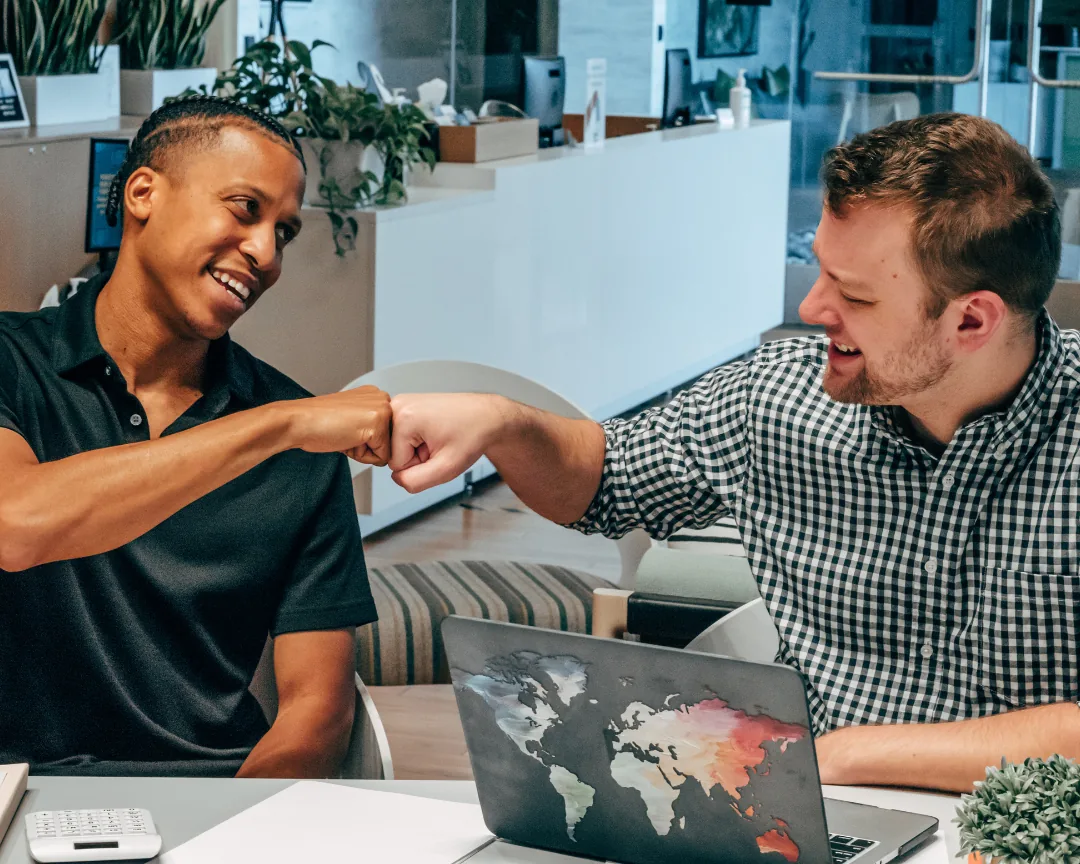 Friends settling up shared expenses over coffee